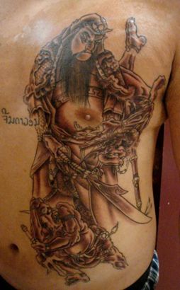 Tibetian Tattoo On Chest